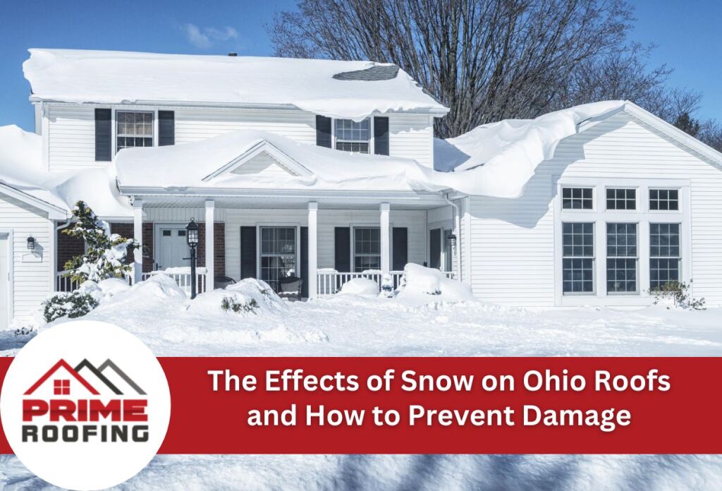 White two-story house with heavy snow accumulation on roof, black shutters, front porch, and snowy landscape